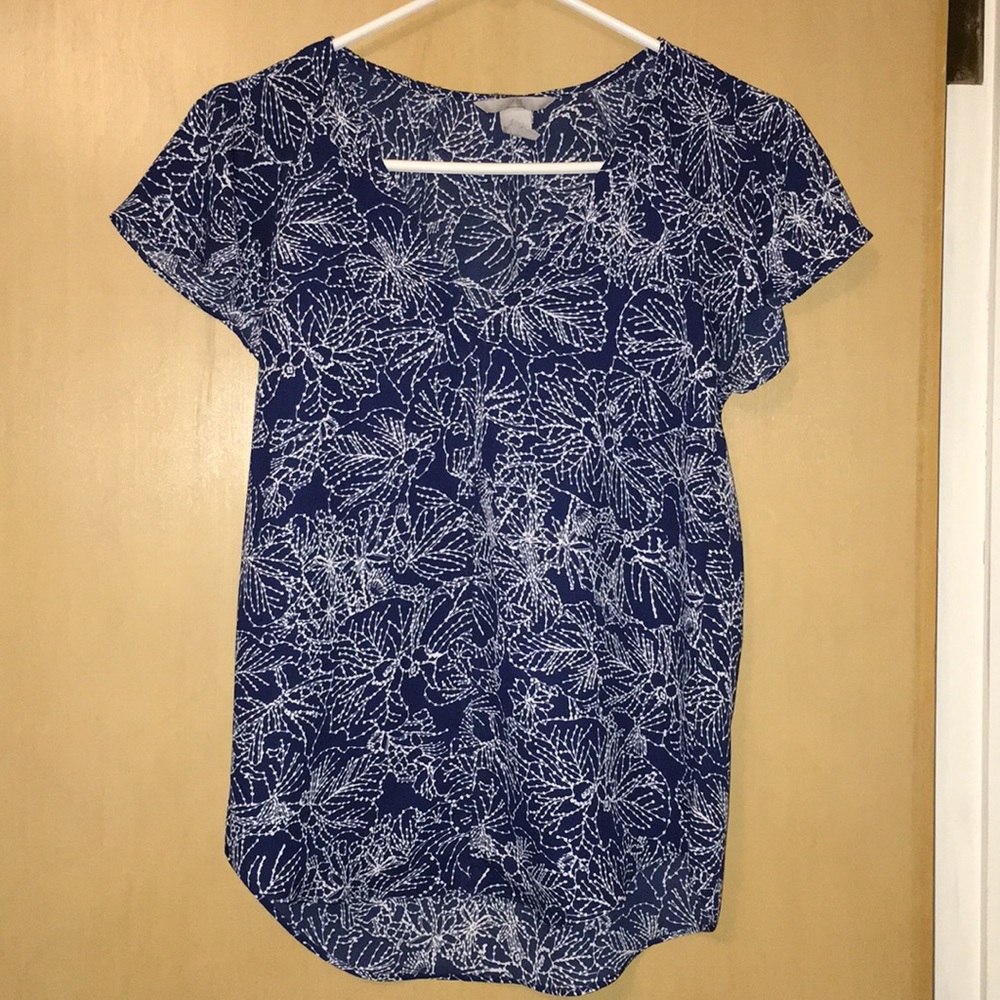 Navy short sleeve H&M blouse with white flowers.